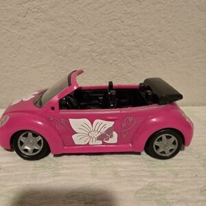 Barbie Pink Volkswagen Beetle Covertible Car.